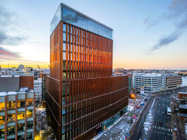 A view of the We Land building in dusk.