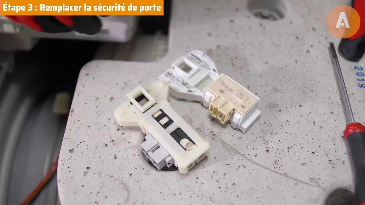 Comment changer la sécurité de porte d'un lave-linge ?