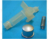 Botón gris + muelle