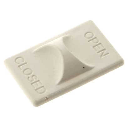 Botón blanco de bloqueo de la rejilla image