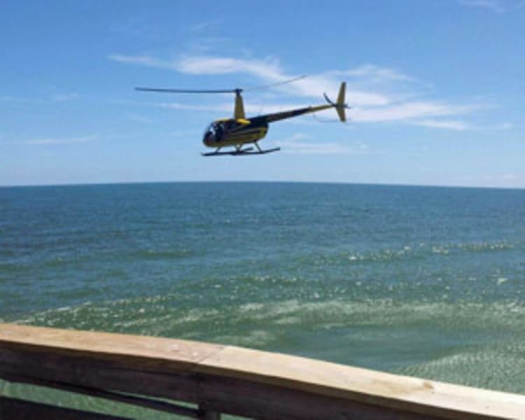 Image of Helicopter Tour Cocoa Beach, Doors Off Flight - 15 Minutes