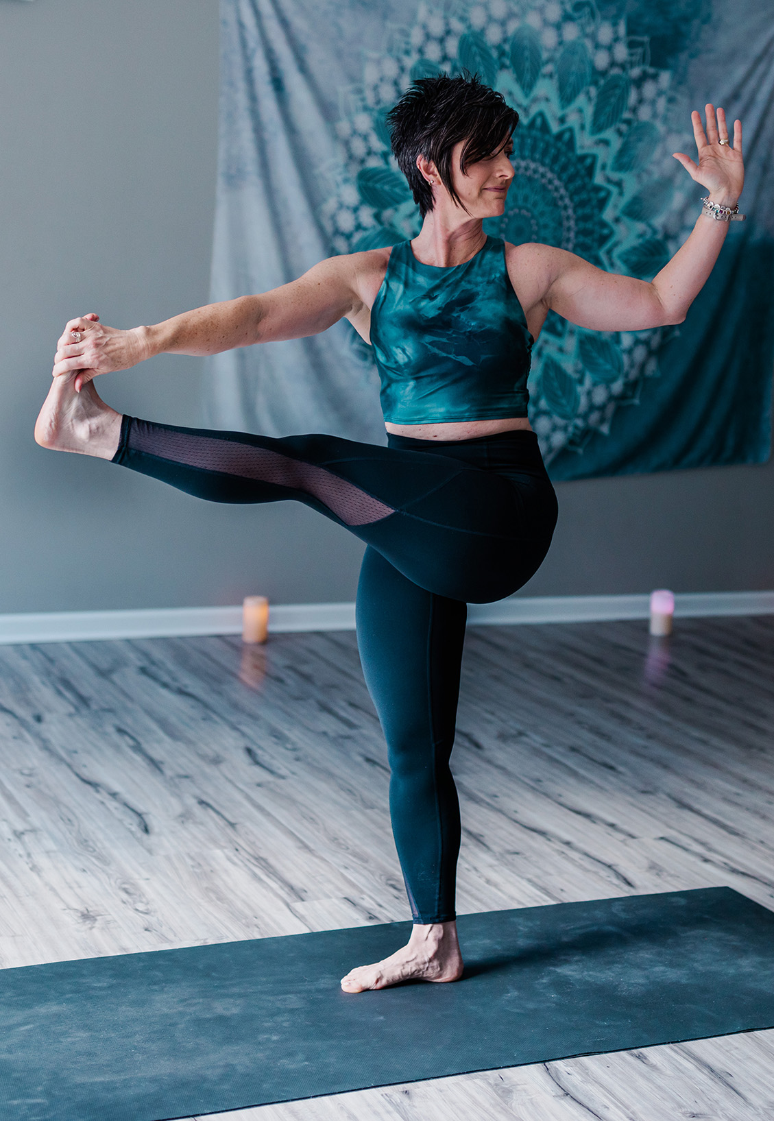 Performing yoga at the Advanced Training's studio.