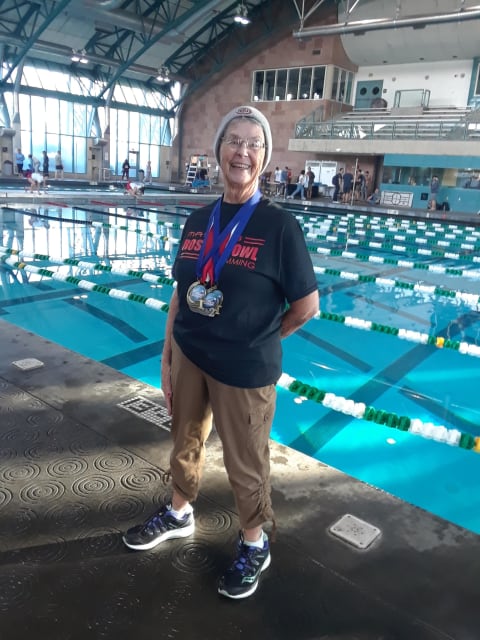 Lynda Leopold with medals