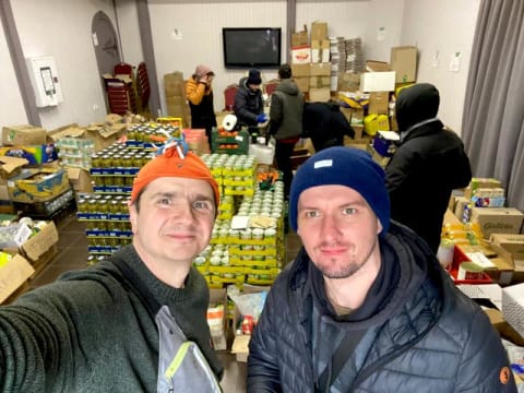 Two workers at distribution center in Ukraine