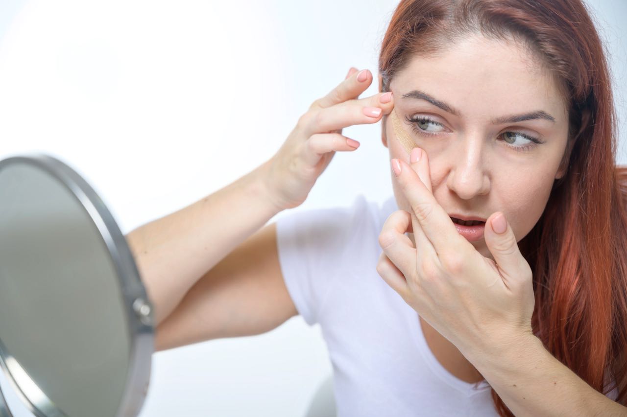 Does the TikTok trend of face taping to stop wrinkles work? A