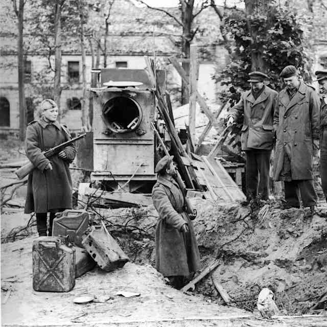 Soviet Soldiers In The Ruins Of Hitler'S Bunker