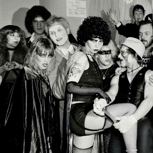 Some of the 700 'Rocky Horror Picture Show' fans who lined up in the rain two hours before the final midnight screening of the cult movie that was a favorite at Toronto's Roxy Cinema for seven years.