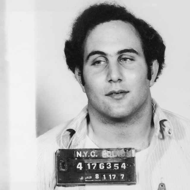 Two black and white mugshot-style photographs of a man, one showing his profile and the other a frontal view. The man has a serious expression on his face and the background appears to be a plain wall or surface.