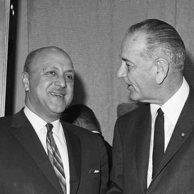 Robert C. Weaver, seen here with President Lyndon B. Johnson, is sworn in as Secretary of Housing and Urban Development at a White House ceremony.
