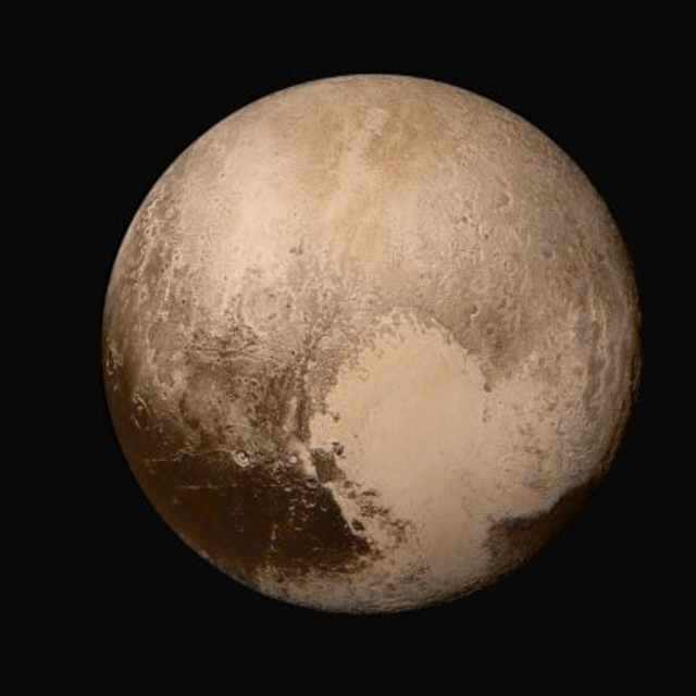IN SPACE - JULY 14: In this handout provided by the National Aeronautics and Space Administration (NASA), Pluto nearly fills the frame in this image from the Long Range Reconnaissance Imager (LORRI) aboard NASA's New Horizons spacecraft, taken on July 13, 2015, when the spacecraft was 476,000 miles (768,000 kilometers) from the surface. This is the last and most detailed image sent to Earth before the spacecraft's closest approach to Pluto. New Horizons spacecraft is nearing its July 14 fly-by when it will close to a distance of about 7,800 miles (12,500 kilometers). The 1,050-pound piano sized probe, which was launched January 19, 2006 aboard an Atlas V rocket from Cape Canaveral, Florida, is traveling 30,800 mph as it approaches. (Photo by NASA/APL/SwRI via Getty Images)