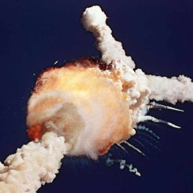 The space shuttle Challenger exploded 73 seconds after lift off. (Credit: Bruce Weaver/AP Photo)