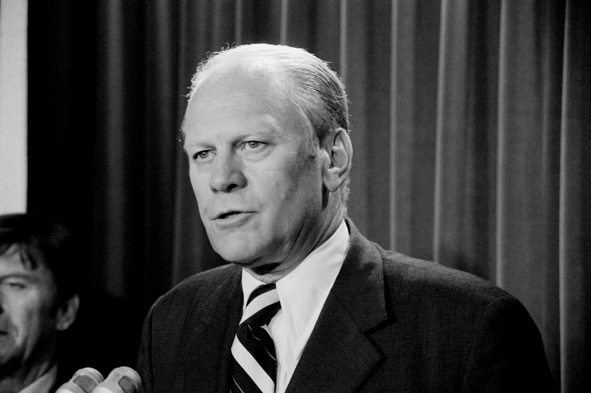 Gerald R Ford, Head and Shoulder Portrait speaking to Press shortly after becoming US President upon Richard Nixons Resignation
