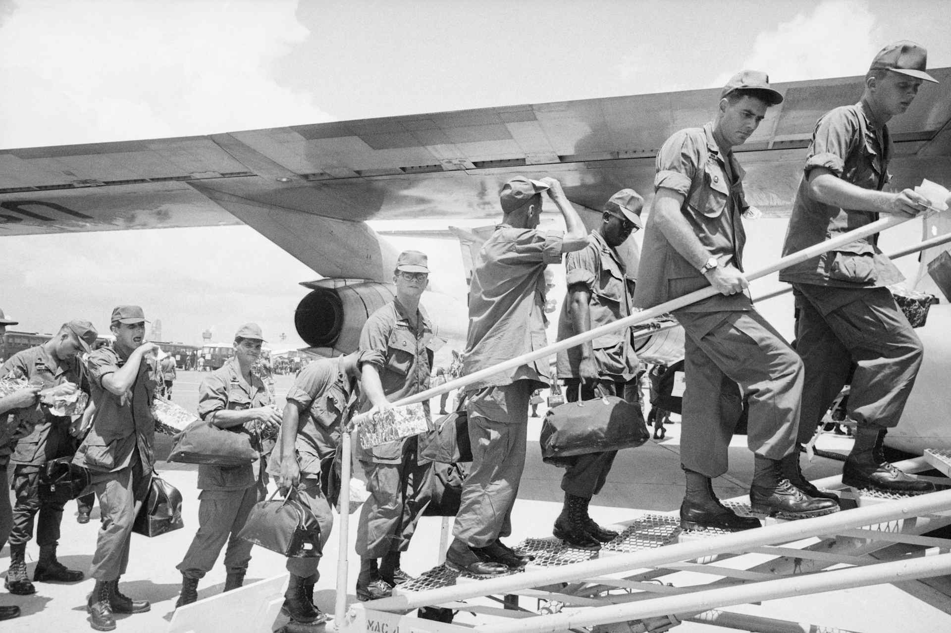 American Troops Boarding A Jet