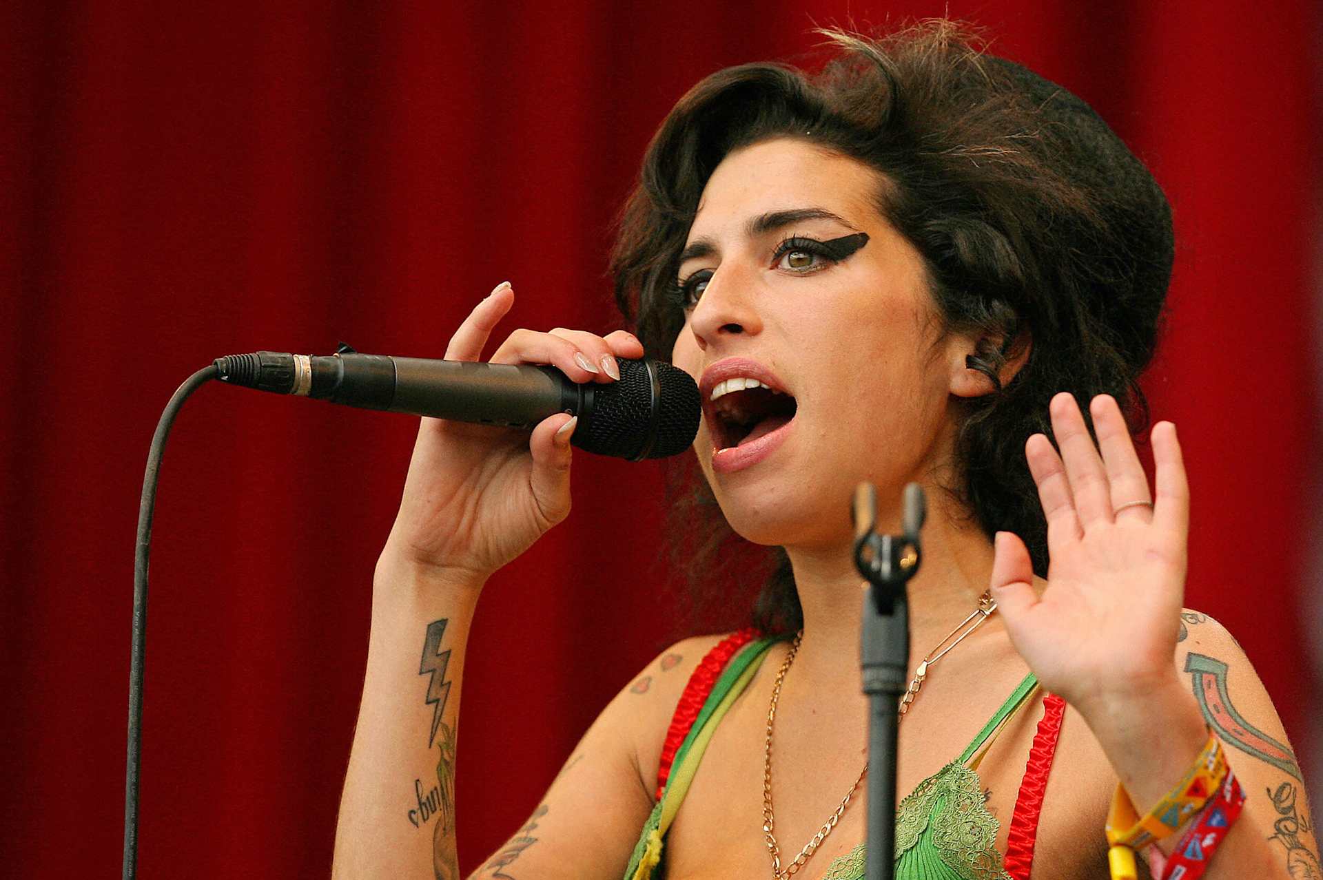 Close-up of British pop singer Amy Winehouse performing at the Glastonbury music festival, in Somerset, England, June 22, 2007.