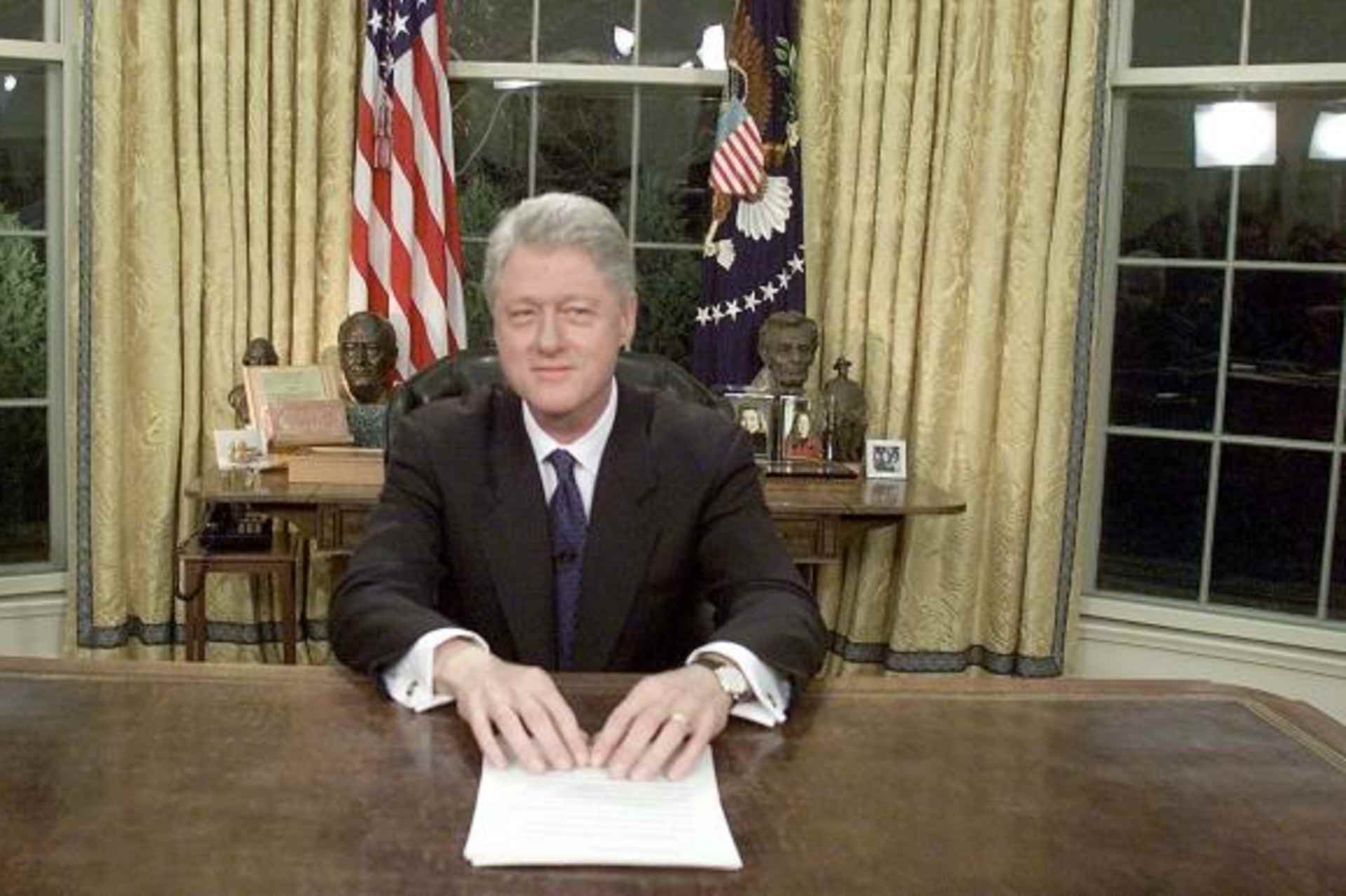 US President Bill Clinton poses for photographers January 18, 2001 after delivering his farewell address to the nation. (Credit: Mark Wilson/Newsmakers)