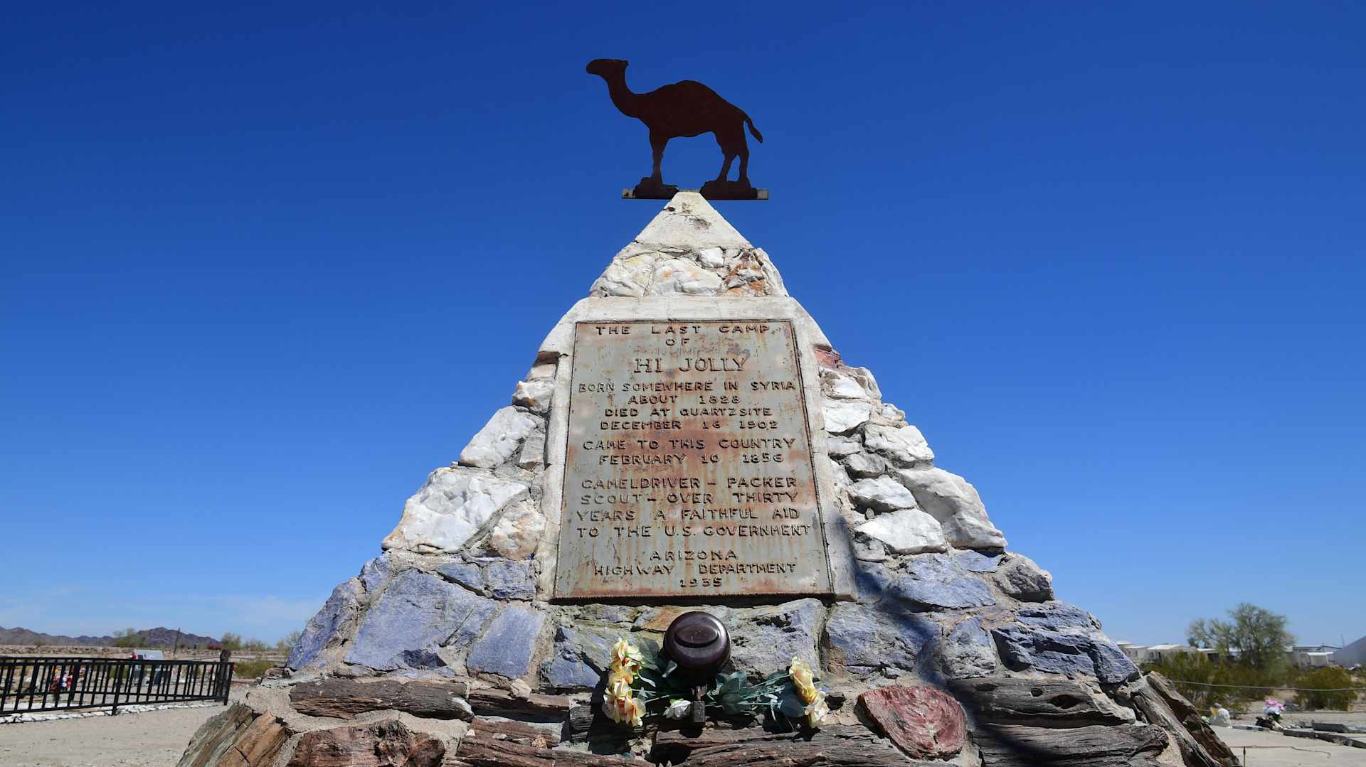 A pyramid-shaped Arizona monument with a camel sculpture on top, a tribute to one of the dromedaries that roamed the Southwest, carrying freight and people in the mid 19th century as part of the US Army's "Camel Corps" experiment.