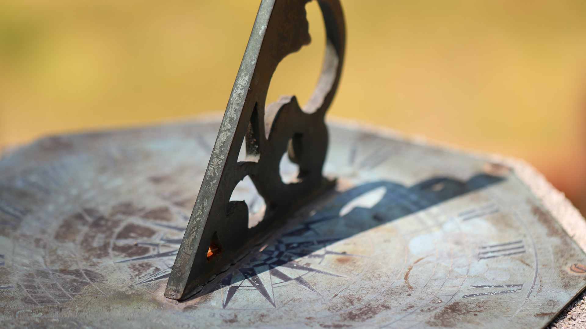 Sundial under the sun. Guideline in the center.