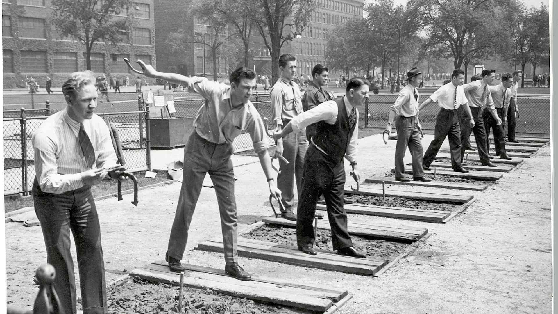 Men Throwing Horeshoes