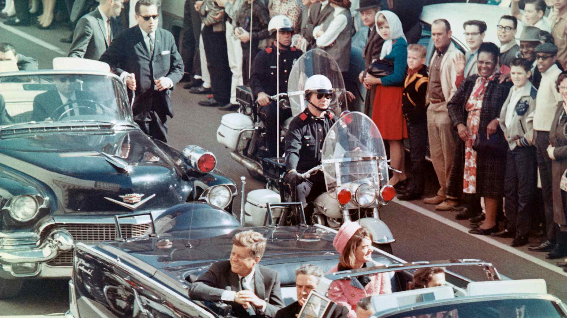 Kennedys Riding in Dallas Motorcade