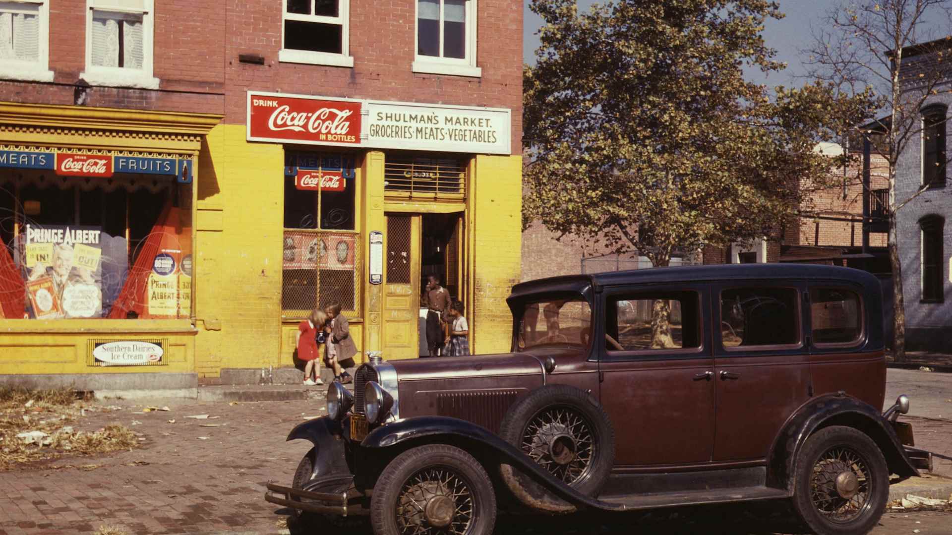 1931 Chevrolet parked in front of a market, Washington, D.C., 1941.