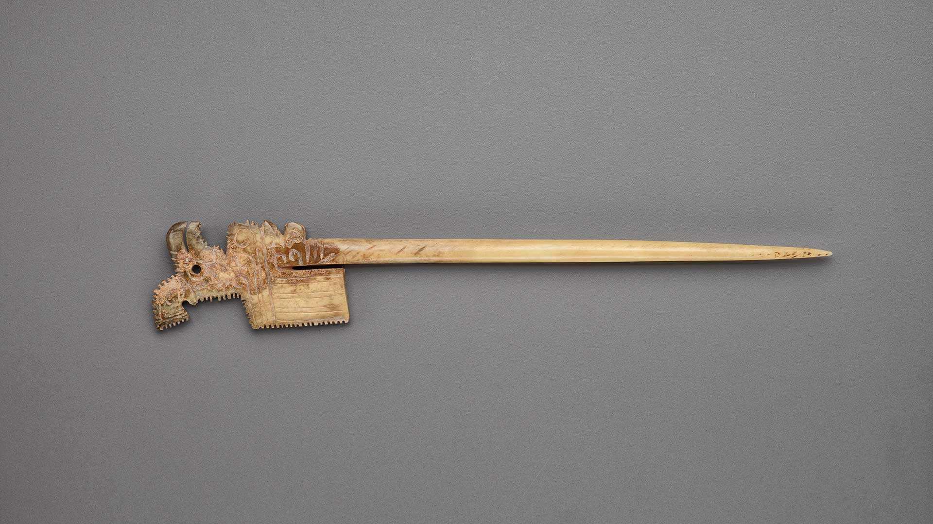 A hairpin carved from bone from the Shang Dynasty.