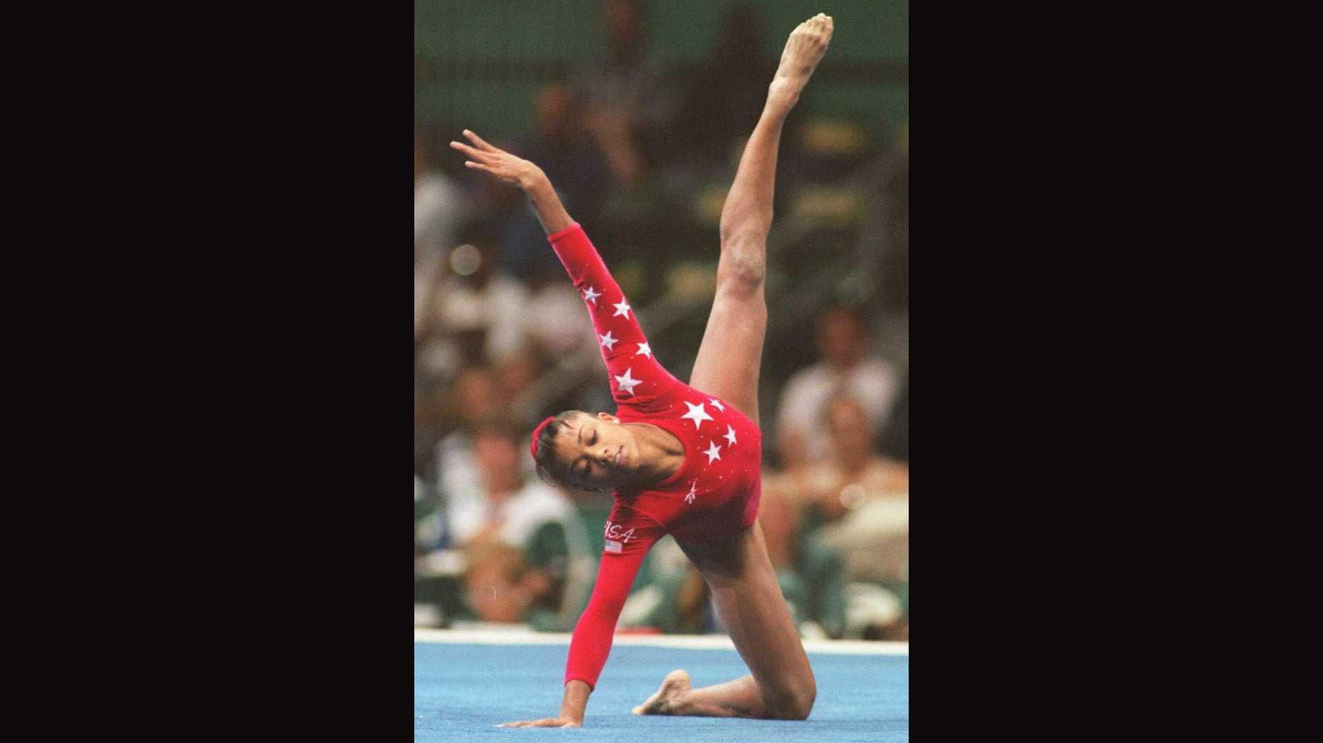 ATLANTA, GA - JULY 30: Dominique Dawes of the US performs her routine in the Olympic individual floor event 29 July. Dawes took the bronze.