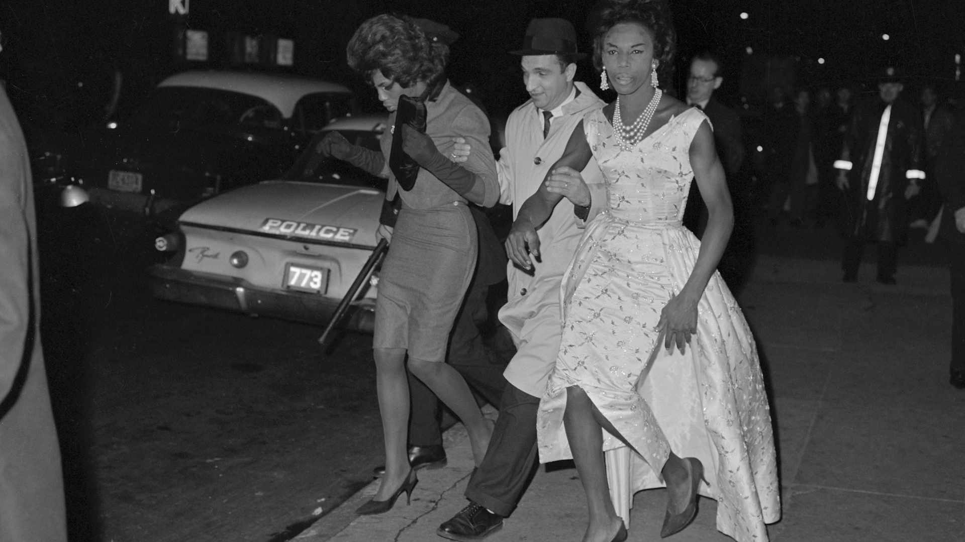 People in drag being arrested