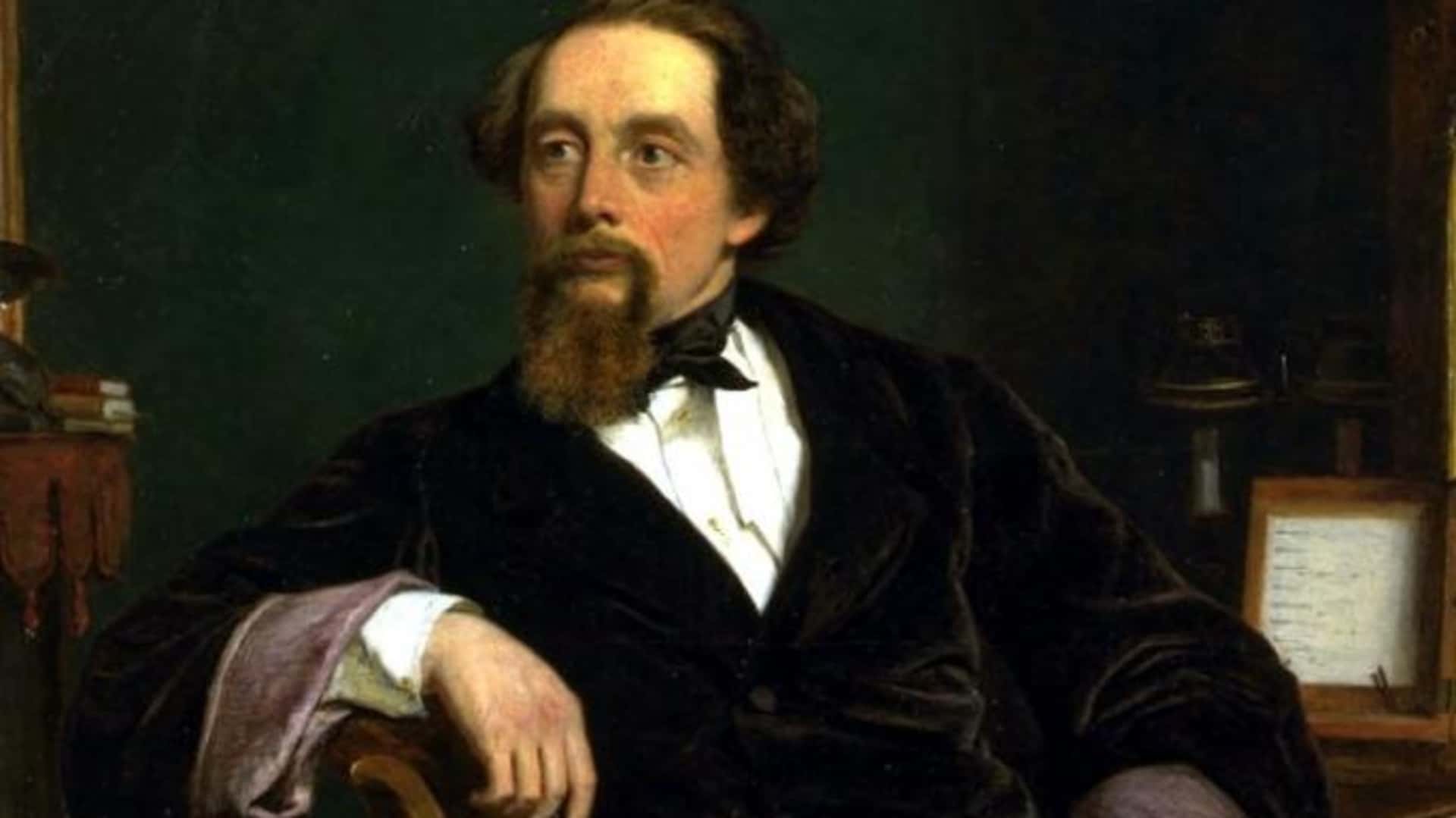 English novelist Charles Dickens (1812 - 1870) at his writing desk. (Photo by Stock Montage/Getty Images)