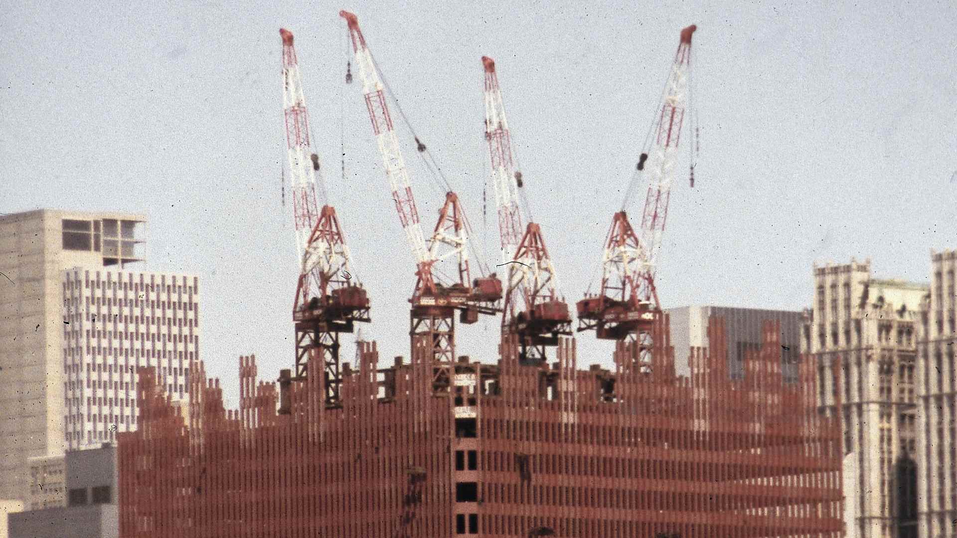 View from the Hudson River of the first tower of the World Trade Center under construction, New York City, circa 1970
