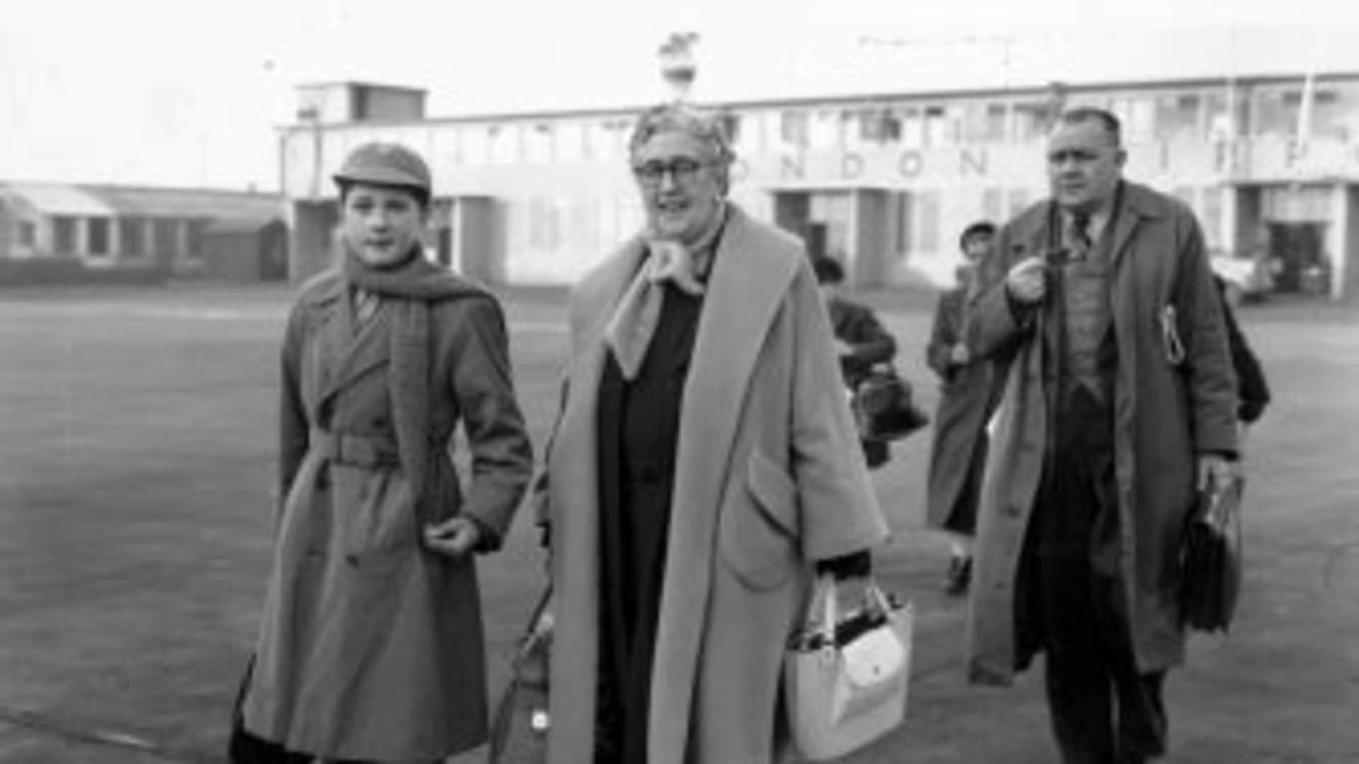 English crime writer Agatha Christie at London Airport with her grandson, Matthew Pritchard
