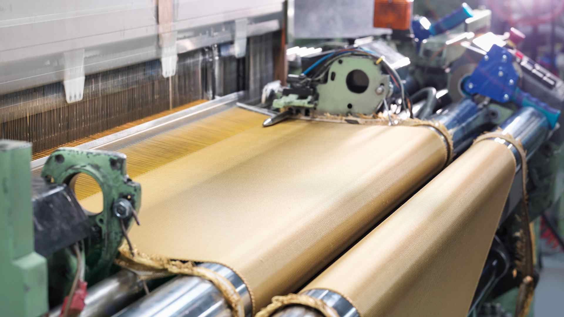 Loom weaving kevlar fabric in carbon fibre factory