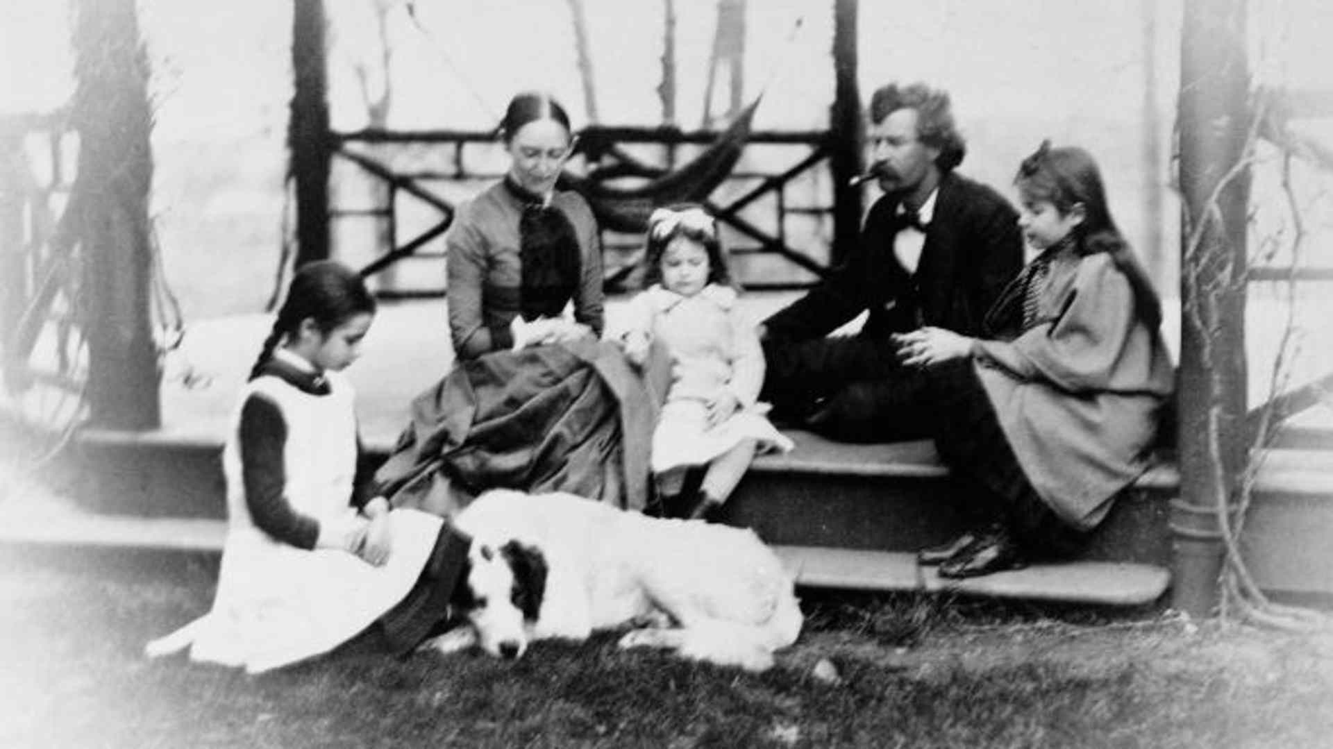 Mark Twain with family, circa 1865. (Credit: Fotosearch/Getty Images).