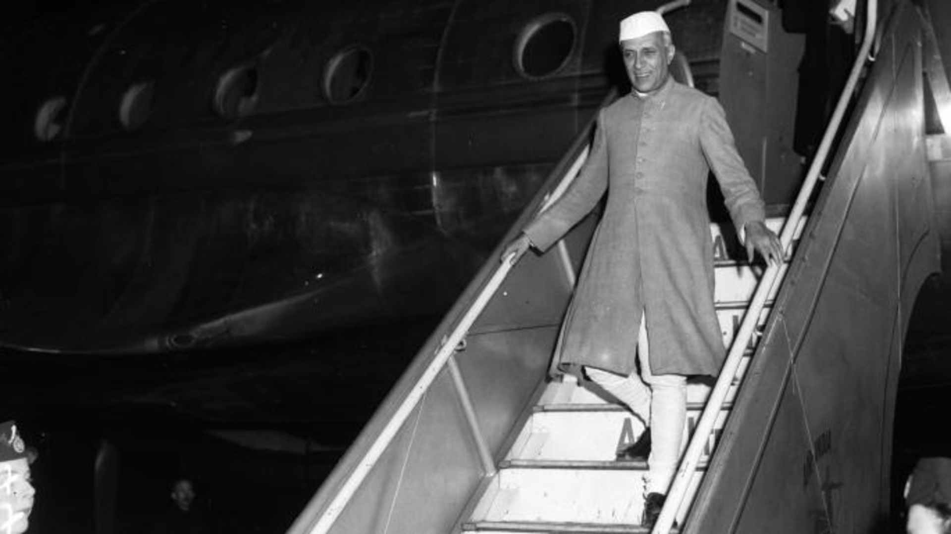 Pandit Jawaharlal Nehru, Indian nationalist leader and statesman, arriving at London airport. (Credit: Allan/Express/Getty Images)