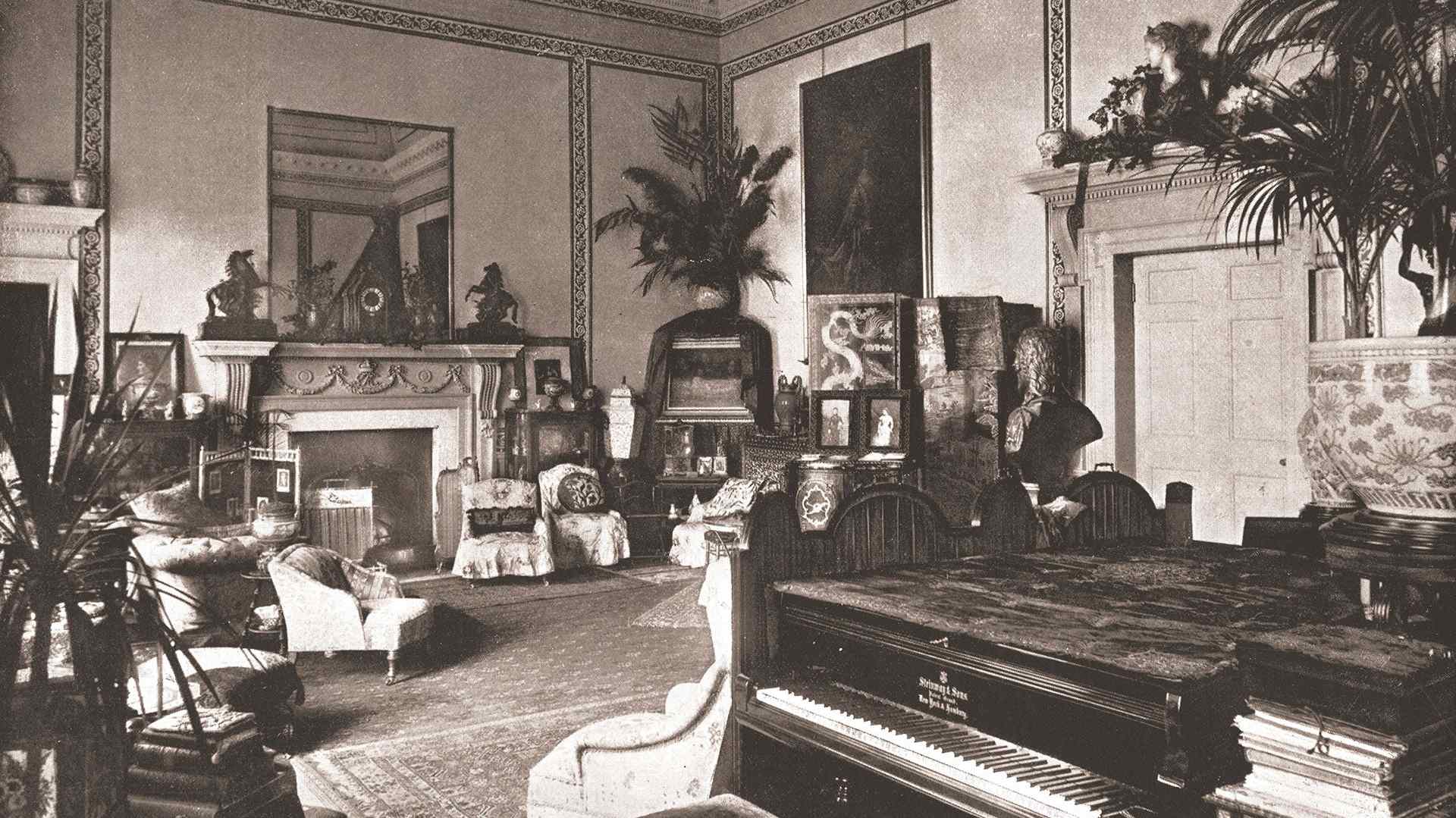 A drawing room with parlor palms, circa 1894.