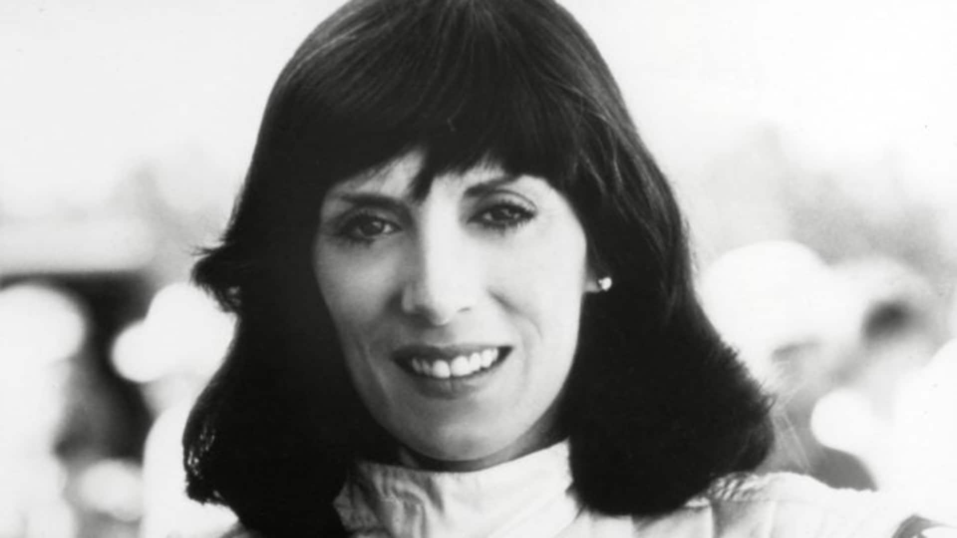 Professional dragster Shirley Muldowney, in the early 1980s. Driving a pink car, she won against the fastest teams in the sport.