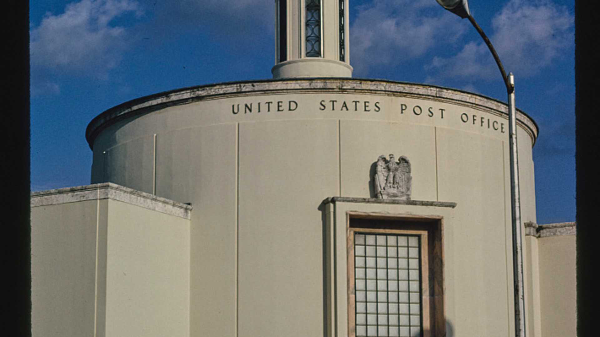 Exterior of the Miami Beach Post Office at Washington Avenue and 12th Street, featuring classic architectural elements.