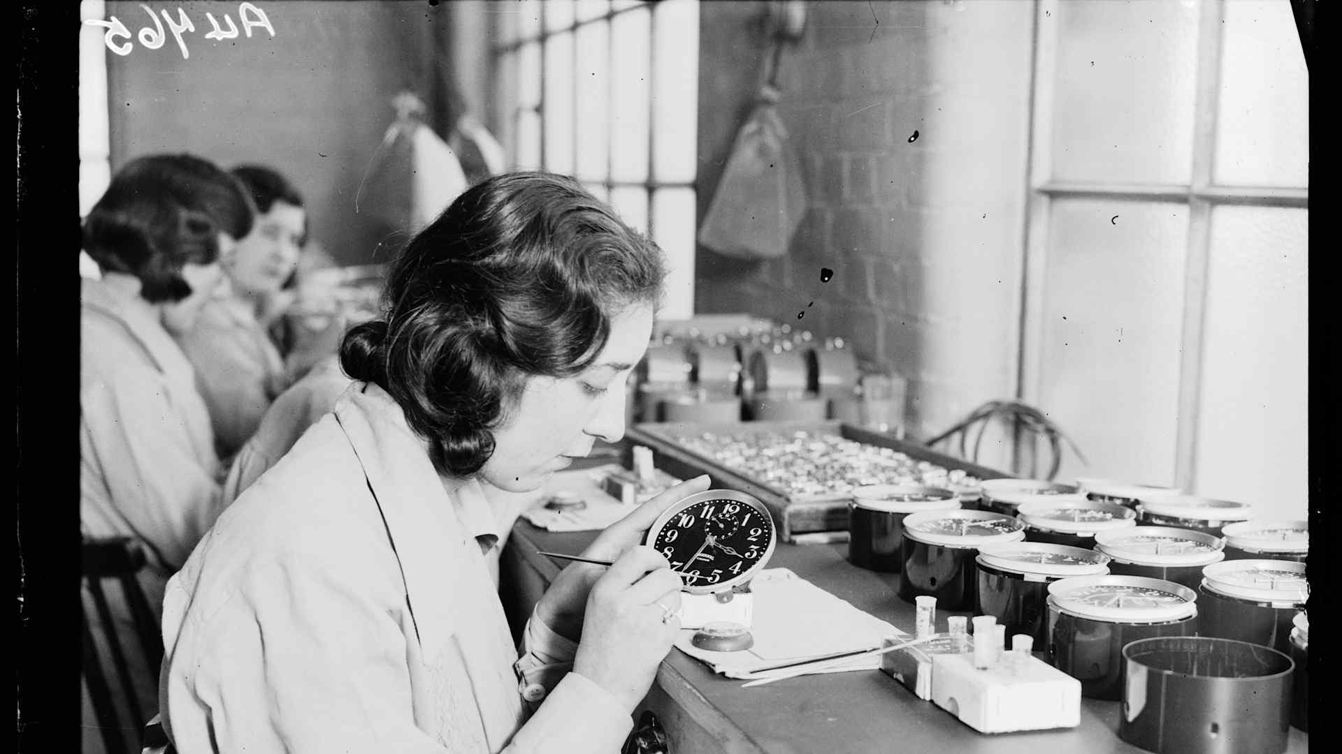 Women painting alarm clock faces, Ingersoll factory, January 1932.