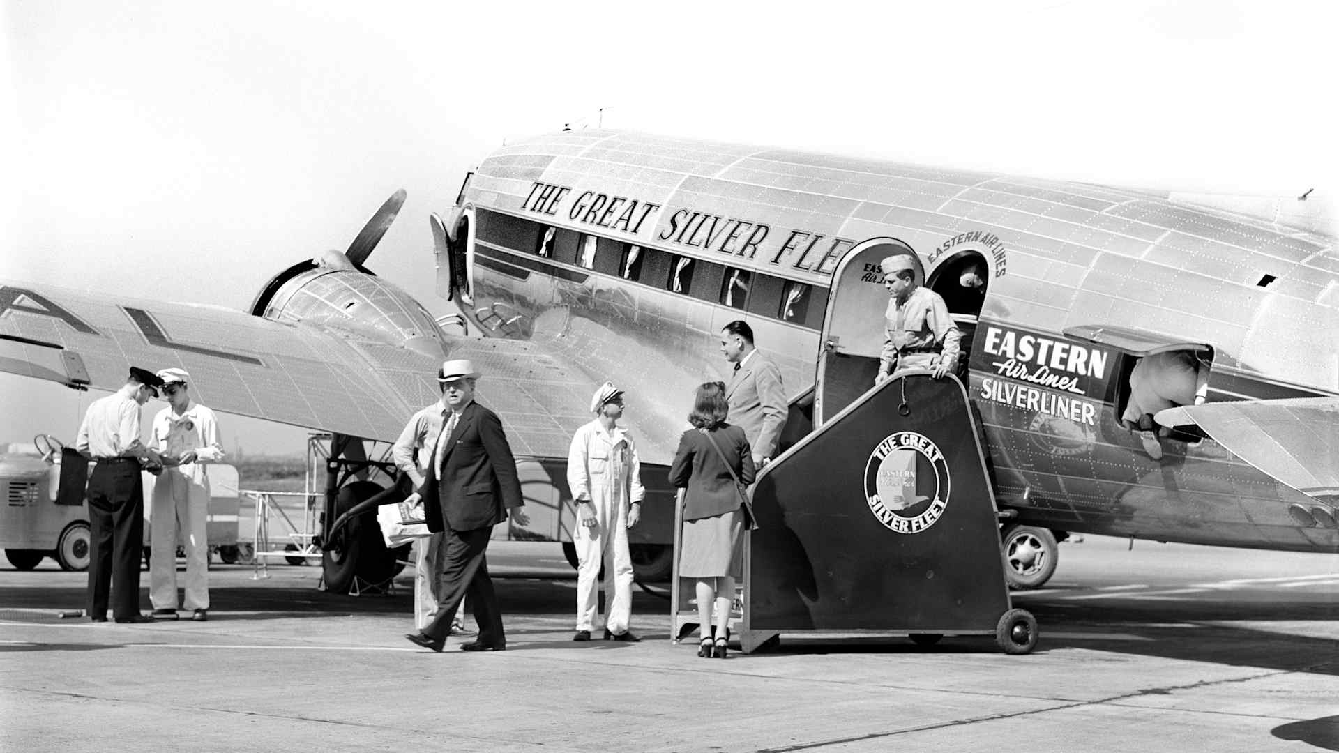 Passengers disembarking Airplane, Municipal Airport, Washington, D.C., USA, Jack Delano, U.S. Farm Security Administration, July 1941