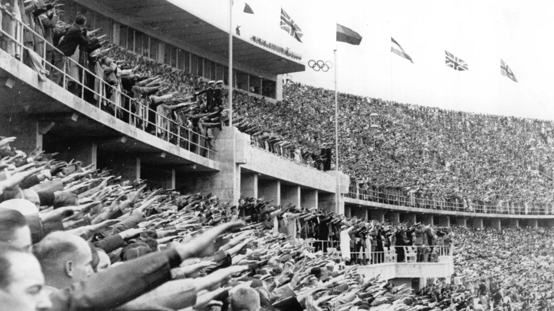 Spectators show the Hitler salute during the opening ceremony of the Summer Olympics on August 1, 1936 in Berlin.