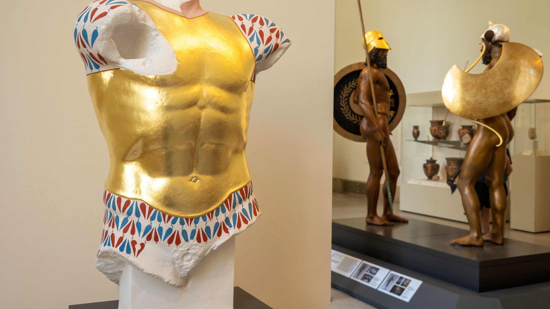 Colorized reconstructions of classical Greek bronze statues found near Riace, Italy at an exhibit of colorized reproductions.