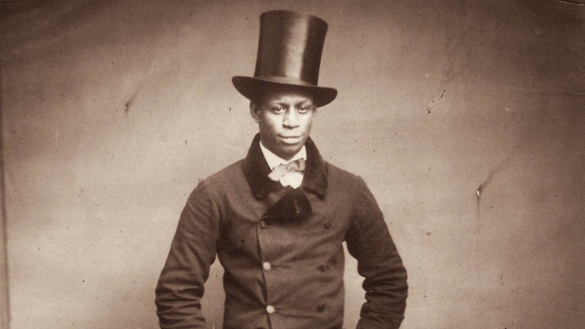 Unidentified Black man wearing a top hat and suit
