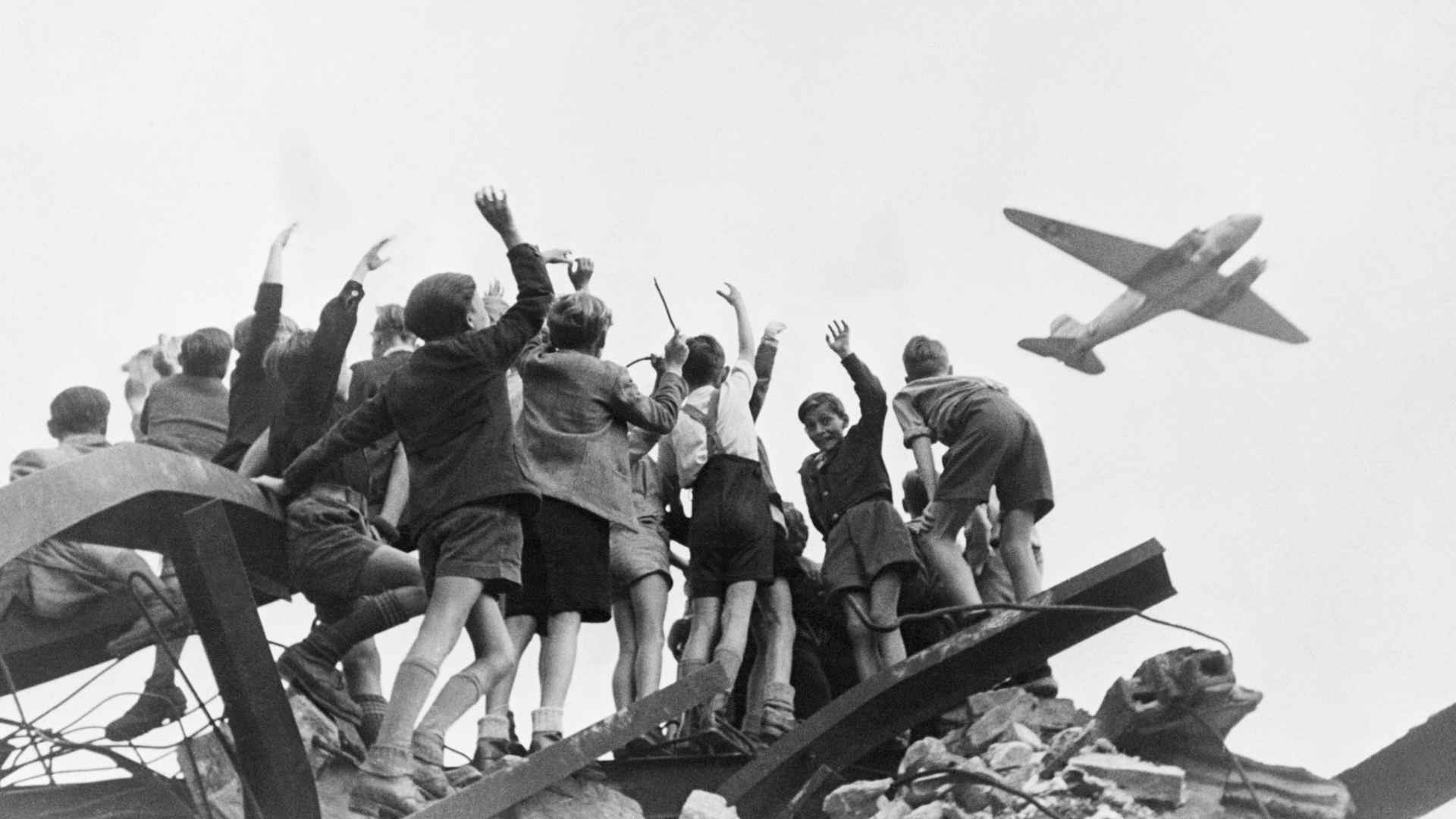 Berlin Children Cheering Airlift Plane