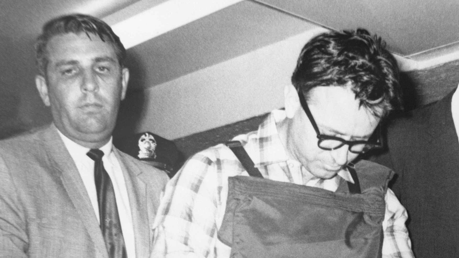 James Earl Ray Led to Cell in Handcuffs