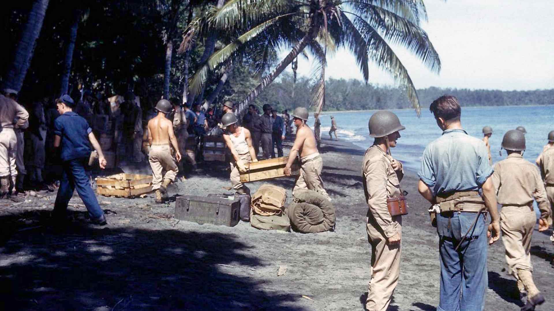 American troops unloading supplies on the shores of Guadalcanal Island.