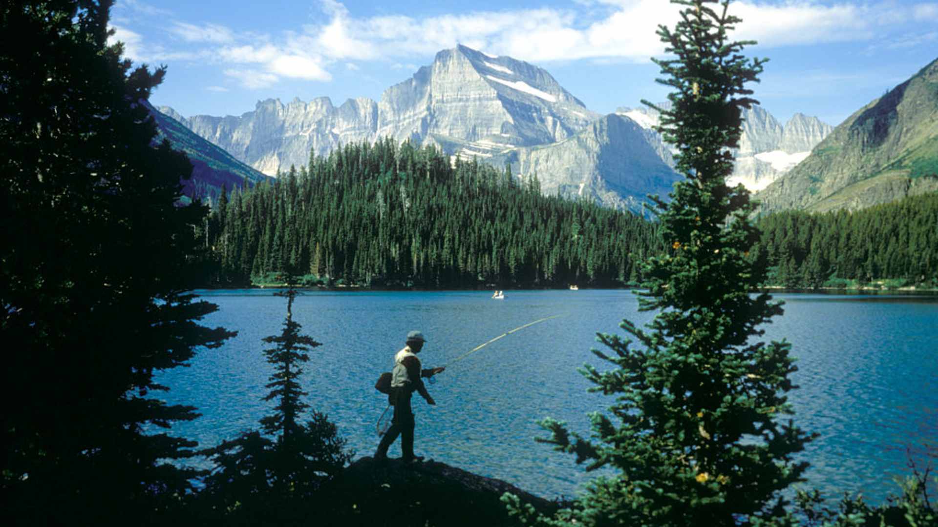 1980s MAN FISHING IN...