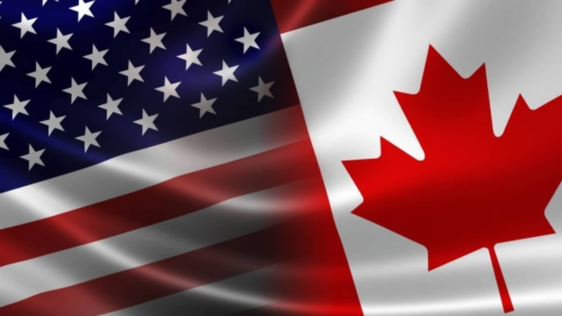 3D rendering of a merged Canadian-USA flag on satin texture. Concept of the mutually influential relations between the two countries politically and economically.