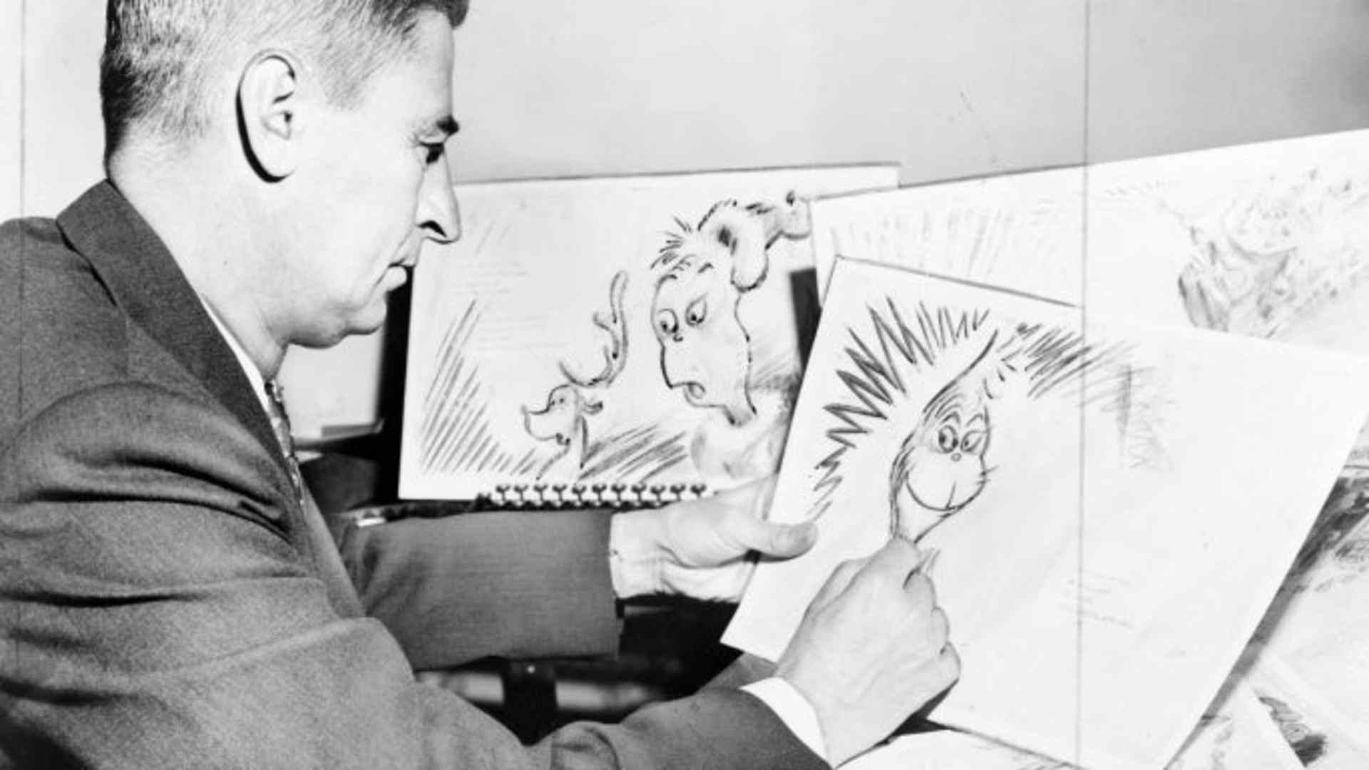 Theodor "Dr. Seuss" Geisel at work on a drawing for "How the Grinch Stole Christmas"