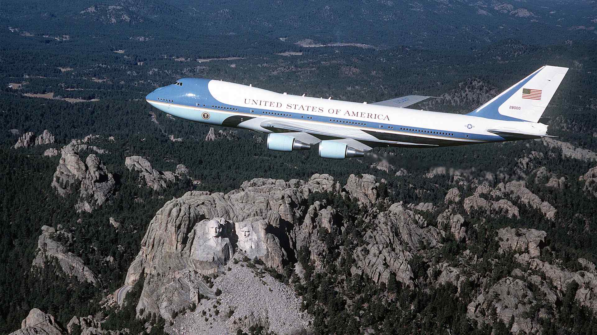 Air Force One flying over Mount Rushmore