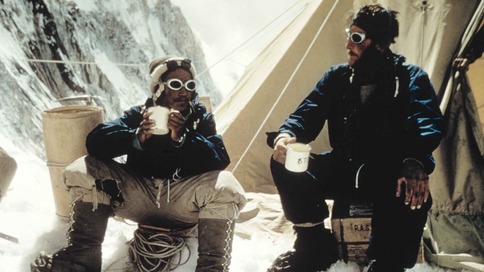 Tenzing Norgay and Edmund Hillary drink tea in the Western Cwm