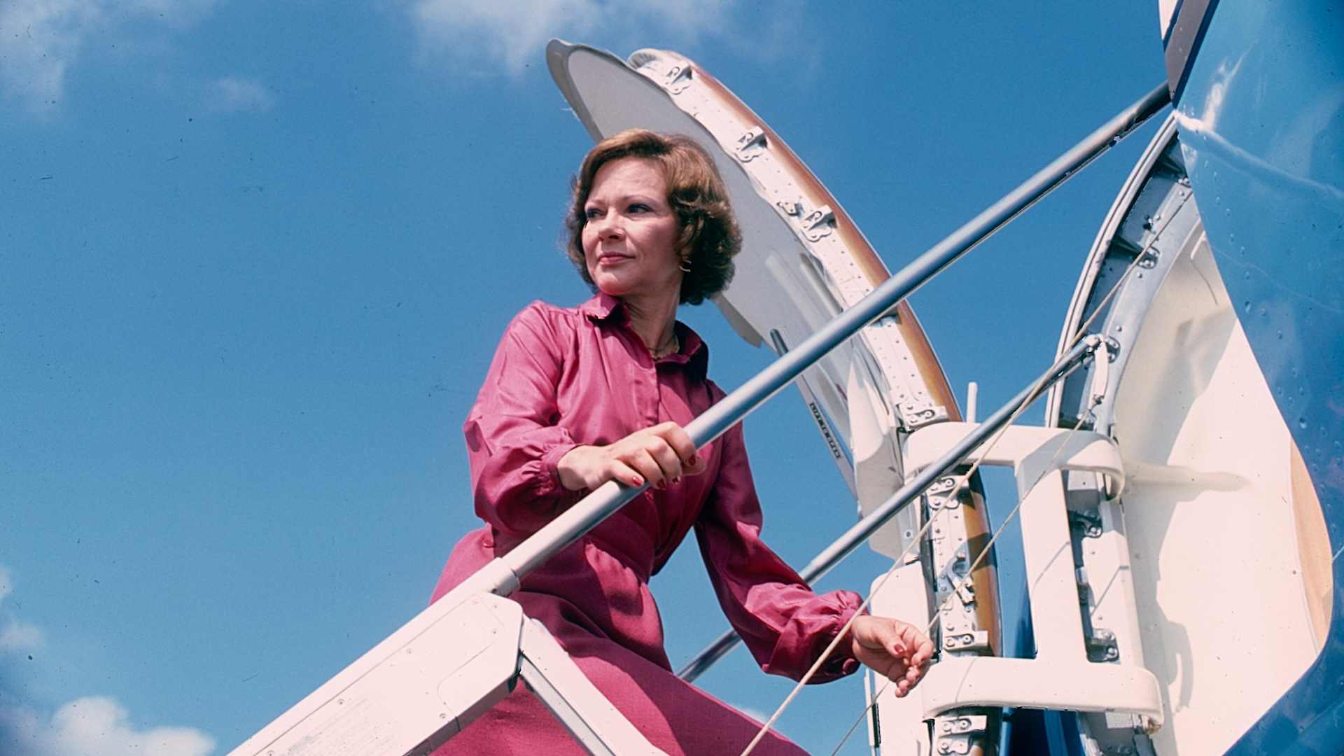 US First Lady Rosalynn Carter climbs the steps to her plane during a trip, Texas, September 1978.